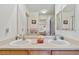 Double sink bathroom vanity complemented by a large mirror, offering ample space at 10050 E Gunnison Pl # 805, Aurora, CO 80247