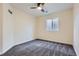 Cozy bedroom featuring neutral walls, plush carpeting, and natural light at 8562 E 49Th Pl, Denver, CO 80238