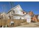 Charming two-story home with fenced yard, garage, and solar panels at 8562 E 49Th Pl, Denver, CO 80238