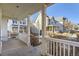 View of the home's front porch showing the exterior and the neighborhood at 8562 E 49Th Pl, Denver, CO 80238