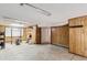 Basement with wood paneled walls and workout equipment at 14333 E Warren Pl, Aurora, CO 80014