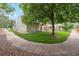 Exterior shot showing a well-maintained home with a green lawn and beautiful landscaping, perfect for outdoor enjoyment at 14333 E Warren Pl, Aurora, CO 80014