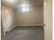 Finished basement with new carpet and a window at 1326 S Canosa Ct, Denver, CO 80219