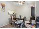 The dining area adjacent to kitchen with nice lighting and comfortable seating at 1112 Elysian Field Dr # E, Lafayette, CO 80026