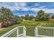 Spacious backyard with a large, well-maintained lawn and mature trees at 3416 Hawthorne Dr, Highlands Ranch, CO 80126