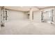 Finished basement with neutral walls, carpeted floors, and glass paneled doors at 3416 Hawthorne Dr, Highlands Ranch, CO 80126