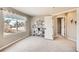 Cozy bedroom filled with natural light, featuring a decorative ladder bookshelf and neutral carpets at 3416 Hawthorne Dr, Highlands Ranch, CO 80126