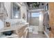 Clean bathroom with a granite countertop and a tub shower combo at 4812 Moonshine Ridge Trl, Parker, CO 80134