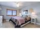 Bedroom with mountain views, carpet floors, and wooden furniture at 4812 Moonshine Ridge Trl, Parker, CO 80134