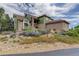 House exterior with landscaping and walkway at 4812 Moonshine Ridge Trl, Parker, CO 80134