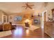 Main bedroom features fireplace, sitting area, and hardwood floors at 4812 Moonshine Ridge Trl, Parker, CO 80134