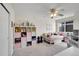 Cozy bedroom with a ceiling fan, closet and ample storage space at 15972 W 70Th Dr, Arvada, CO 80007