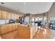 Spacious kitchen featuring a center island, stainless steel appliances, and hardwood floors at 15972 W 70Th Dr, Arvada, CO 80007