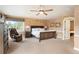 Serene bedroom with king bed, window, and traditional furnishings at 19052 E Briarwood Dr, Centennial, CO 80016