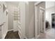 Walk-in closet with custom shelving and drawer systems, offering organized storage solutions at 1775 Catnap Ln, Monument, CO 80132