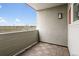 Relaxing balcony with wood-look flooring, plus a view of a green open space at 1585 Hecla Way # 201, Louisville, CO 80027