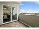 Balcony with wood-look flooring provides outdoor living space with lovely neighborhood views at 1585 Hecla Way # 201, Louisville, CO 80027