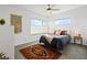 Cozy bedroom with a comfortable bed, soft rug, and plenty of natural light at 1585 Hecla Way # 201, Louisville, CO 80027
