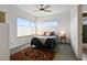 Inviting bedroom with a comfortable bed, neutral tones, and ample natural light at 1585 Hecla Way # 201, Louisville, CO 80027