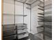 Walk-in closet with custom shelving and ample storage space for organizing your wardrobe at 1585 Hecla Way # 201, Louisville, CO 80027