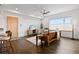 Inviting living room features hardwood floors, a stylish couch, and ample natural light at 1585 Hecla Way # 201, Louisville, CO 80027