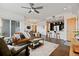 Spacious living area showcasing a modern open floor plan with kitchen, dining, and sitting areas at 1585 Hecla Way # 201, Louisville, CO 80027