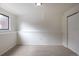 Bedroom featuring neutral carpet, base trim, a window, and a closet with doors at 12425 Albion St, Thornton, CO 80241