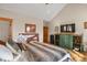 Bedroom with hardwood floors and comfortable decor at 5800 Elk View Ct, Larkspur, CO 80118