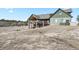 View of the property from the backyard shows multiple levels of outdoor living space at 5800 Elk View Ct, Larkspur, CO 80118