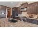 Kitchen featuring a large island, stainless appliances, and lots of counter space at 5800 Elk View Ct, Larkspur, CO 80118
