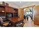 Home office with custom wood built-ins and views to the great outdoors at 5800 Elk View Ct, Larkspur, CO 80118