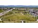 Aerial view of park with pathways, large green space, and mature trees in residential area at 9598 Lowell Blvd, Westminster, CO 80031