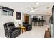 Finished basement with bar area, seating, and entertainment center at 9598 Lowell Blvd, Westminster, CO 80031