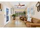 Inviting living room featuring hardwood floors and a large window at 9598 Lowell Blvd, Westminster, CO 80031