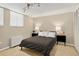 Comfortable bedroom featuring a large window and neutral tones to create a relaxing atmosphere at 909 N Logan St # 1B, Denver, CO 80203