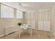 Functional home office setup with a desk, chair, and ample closet space, great for working at 909 N Logan St # 1B, Denver, CO 80203