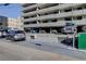 A view of the parking at the building with covered parking and assigned parking spaces at 909 N Logan St # 1B, Denver, CO 80203