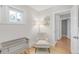 Cozy bedroom featuring a rocking chair, natural light and neutral color palette at 4933 Grove St, Denver, CO 80221