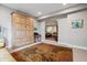 Finished basement with hardwood cabinet, adjacent to secondary sitting area at 35 Brookhaven Pl, Littleton, CO 80123