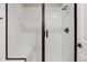 Clean bathroom with glass shower, bench, and modern fixtures at 35 Brookhaven Pl, Littleton, CO 80123