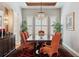 Elegant dining room with a decorative chandelier and seating for eight at 35 Brookhaven Pl, Littleton, CO 80123