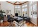 Bright office with wood floors, wood ceiling, and large windows with plantation shutters at 35 Brookhaven Pl, Littleton, CO 80123