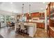 Gourmet kitchen with granite countertops, wood cabinets, and stainless steel appliances at 35 Brookhaven Pl, Littleton, CO 80123