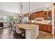 Well-equipped kitchen with a central island, ample counter space, and modern fixtures at 35 Brookhaven Pl, Littleton, CO 80123
