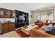 Cozy living room with a media center and comfortable seating at 35 Brookhaven Pl, Littleton, CO 80123