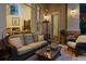 Cozy outdoor living space with comfortable sofa, coffee table, and stylish decor at 35 Brookhaven Pl, Littleton, CO 80123