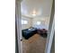 Cozy bedroom with a simple bed frame and a desk, perfect for a student or guest at 6710 Clermont St, Commerce City, CO 80022
