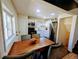 Dining room with ample natural light adjacent to the kitchen at 6710 Clermont St, Commerce City, CO 80022