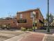 Exterior view of School House Kitchen & Libations in a brick building, displaying its vintage charm at 5703 Ammons St, Arvada, CO 80002