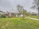 Charming single-story home featuring a well-kept lawn and inviting front entrance at 5703 Ammons St, Arvada, CO 80002